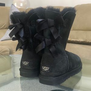 Ugg black bow tie boots.